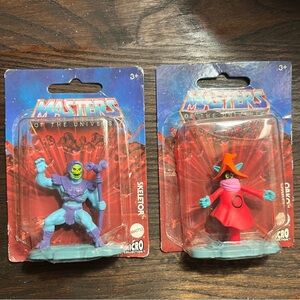 Mattel Masters of the Universe Skeletor and Orko Figures - Blue and Red